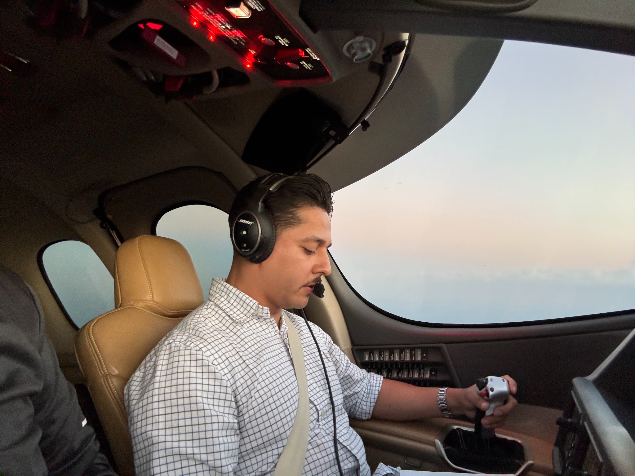 Enrique Gonzalez flying in an aircraft cockpit
